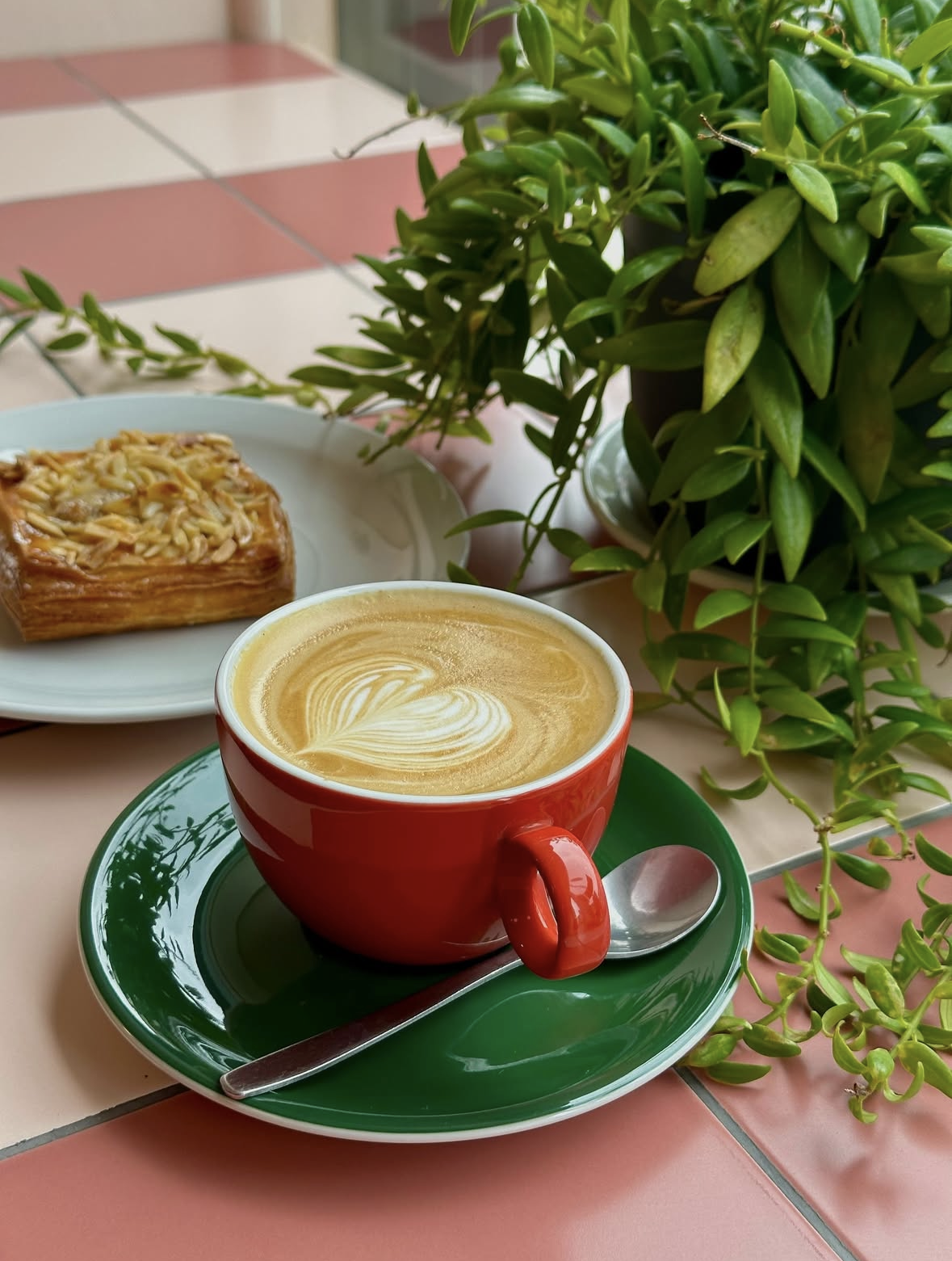 Speciality coffee latte art and fresh pastries at Intervallo Italian cafe in Deptford London